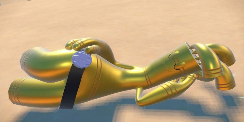 pokemon-scarlet-violet-gholdengo-laying