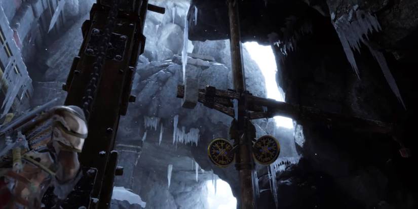 pulling chains to move a heavy lift in god of war ragnarok