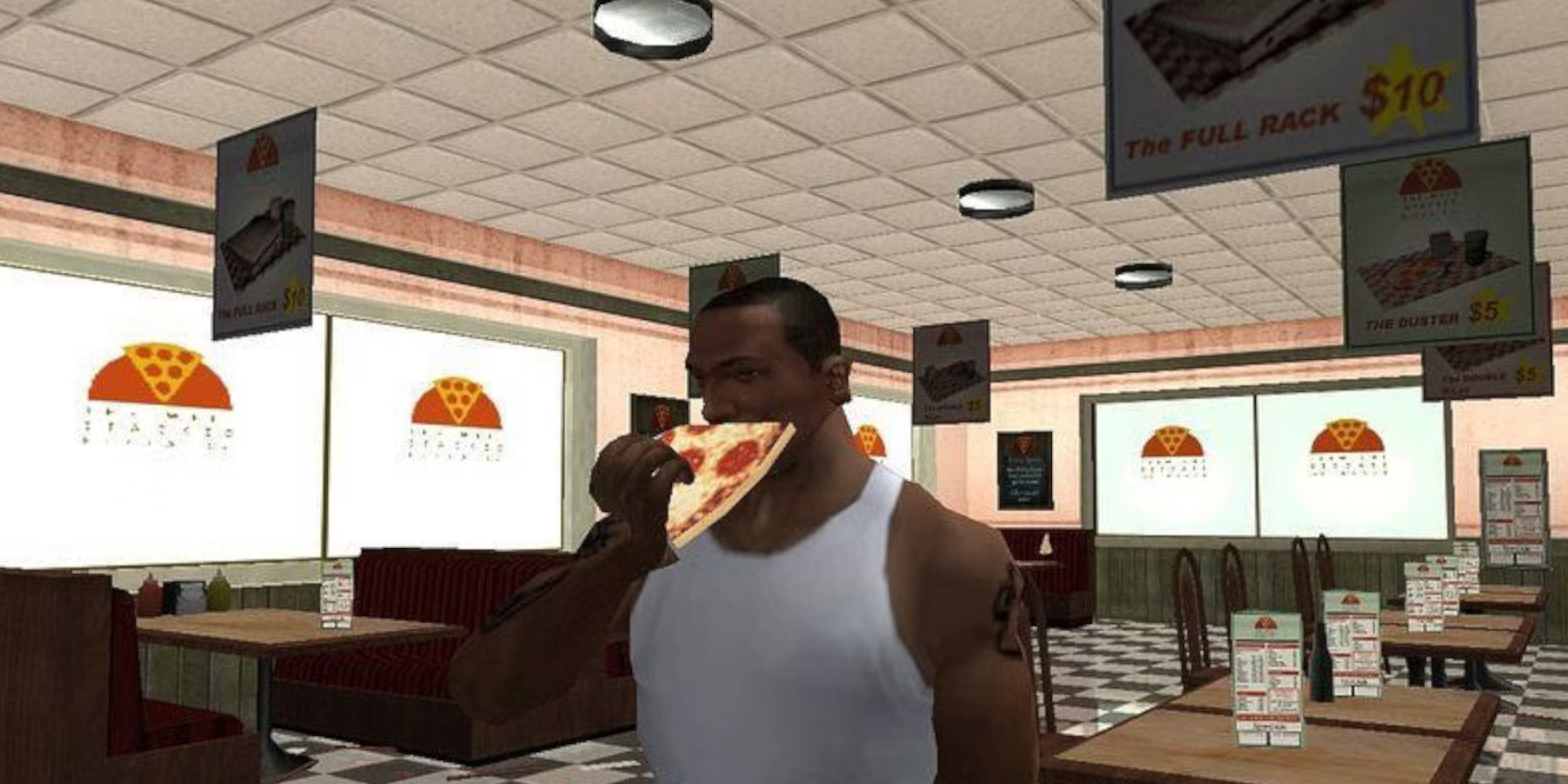 CJ eats a slice of pizza