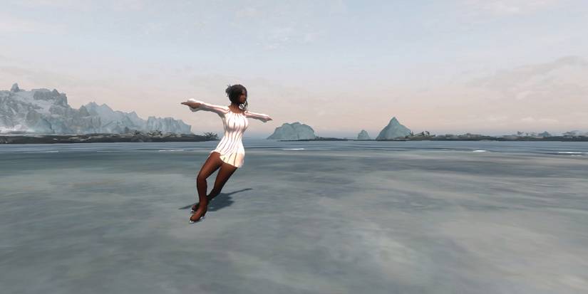 Screenshot from Skyrim showing an elegant female character figure skating on ice.