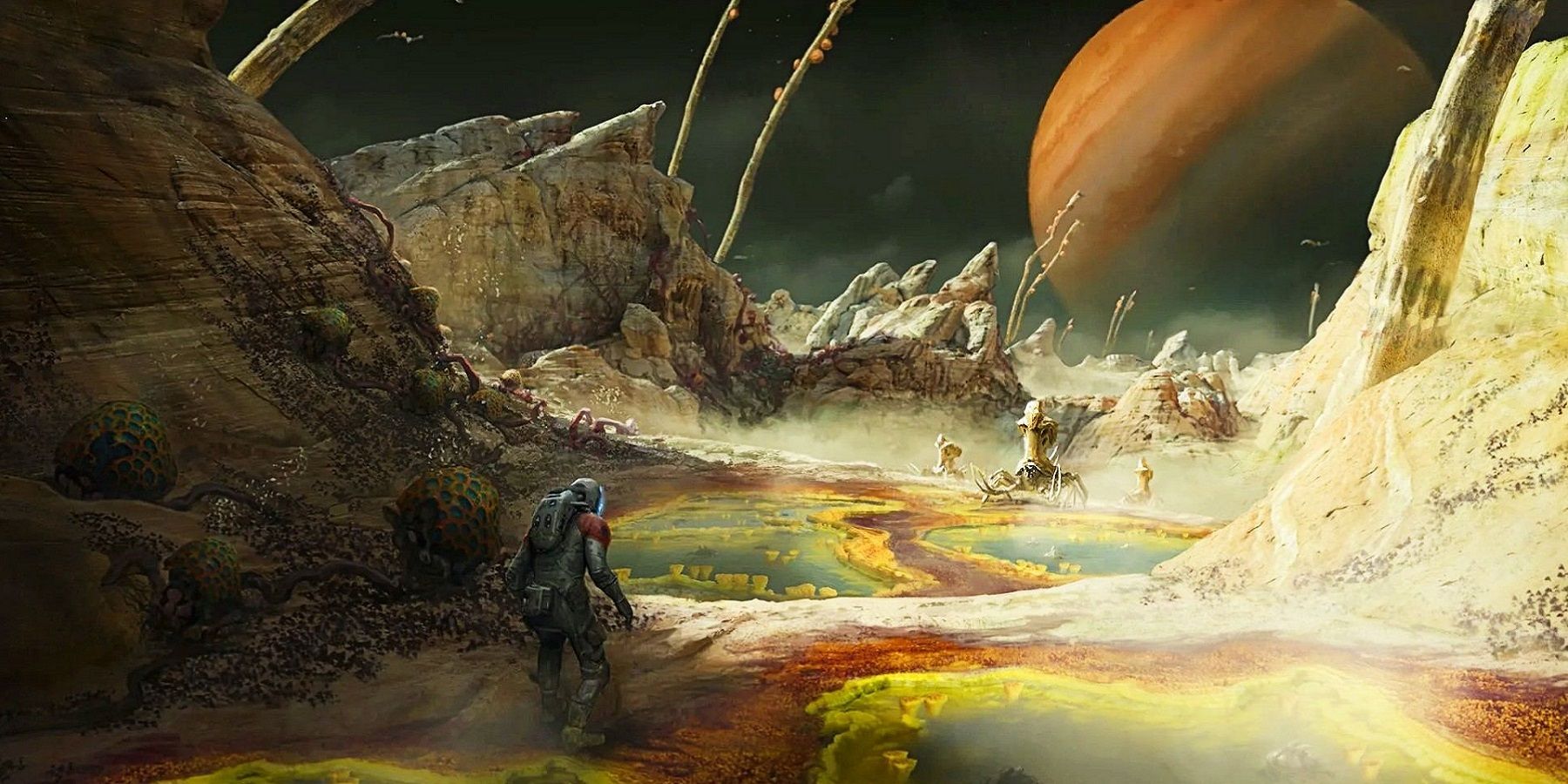 Image from Starfield showing an astronaut on a desolate planet with another planet looming in the background.