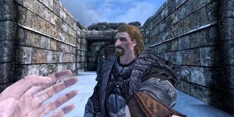 Image from Skyrim VR showing the player dragging Ulfric Stormcloak.