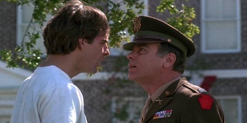 Sam and Al realize they have switched places and stare at each other in shock. Al is in an army uniform and Sam in a white tshirt