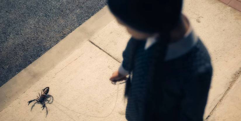 Wednesday walking her pet scorpion Nero in the 2022 spinoff series