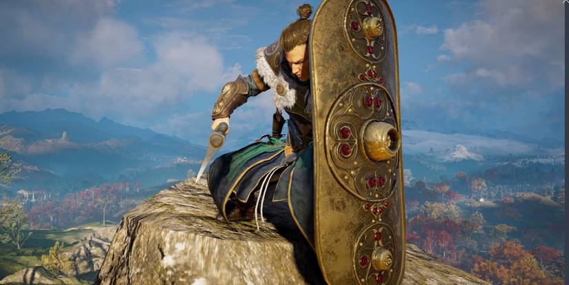 Assassin's Creed Valhalla Cu Chulainn Shield displayed by Eivor as they cover behind it