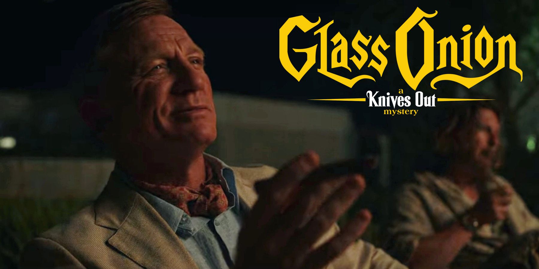 Daniel Craig as Benoit Blanc celebrating with Knives Out: A Glass Onion Mystery logo