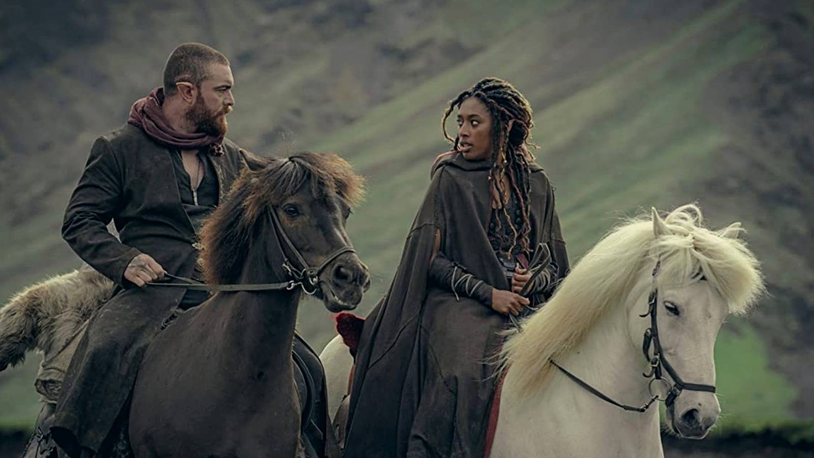  The Witcher: Blood Origin Sophia Brown as Éile Laurence O’Fuarain as Fjall riding horses