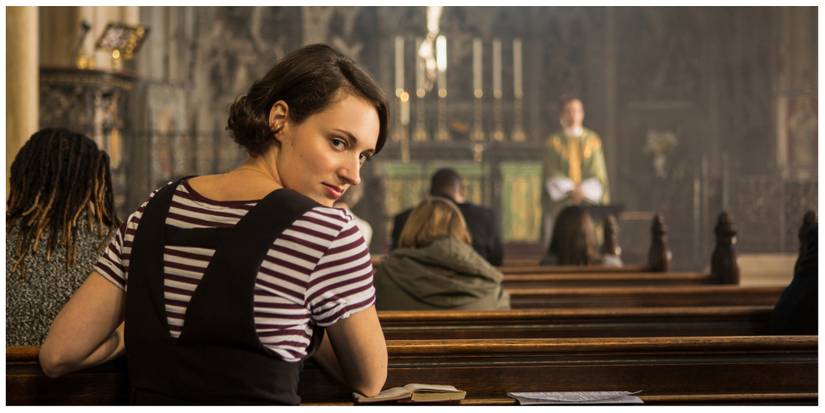 Fleabag turning to face the camera in church