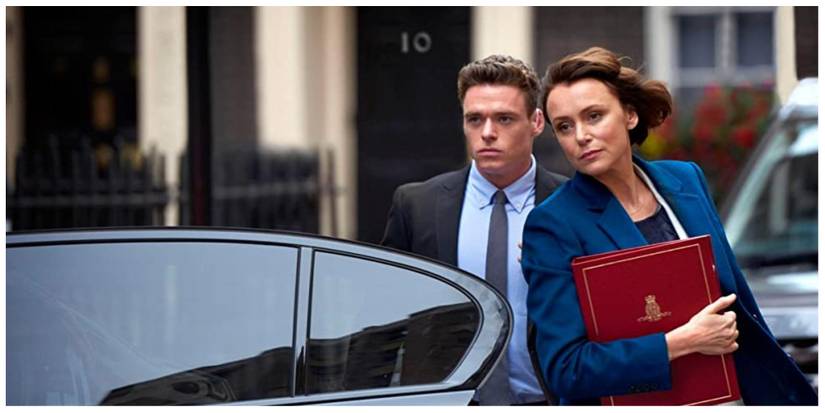 Keeley Hawes and Richard Madden exiting a car outside 10 Downing Street in Bodyguard