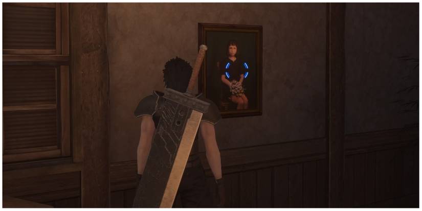 Zacks stares at a portrait in Crisis Core: Final Fantasy 7 Reunion