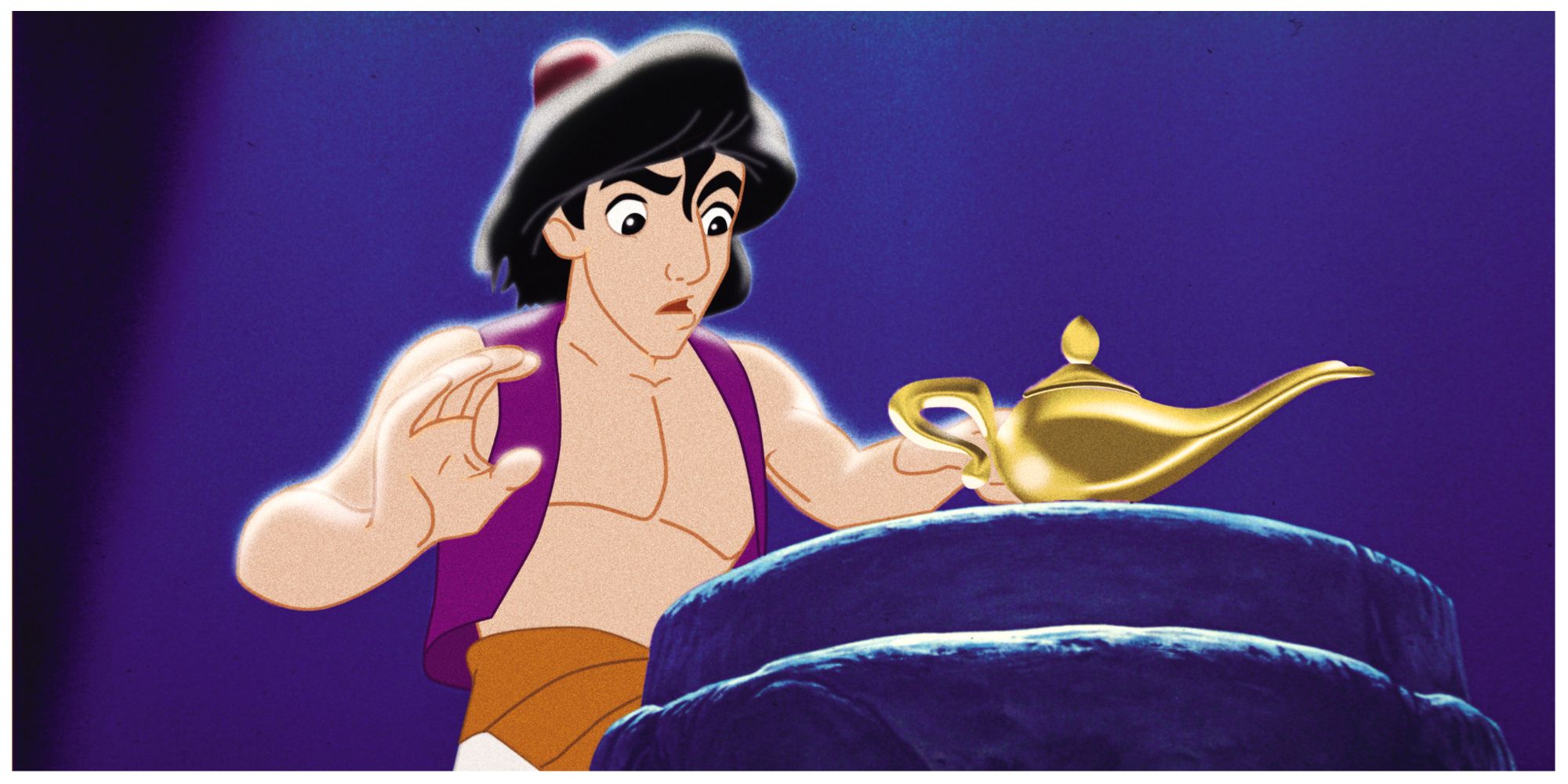 Aladdin looking at the lamp in the temple in Disney's Aladdin