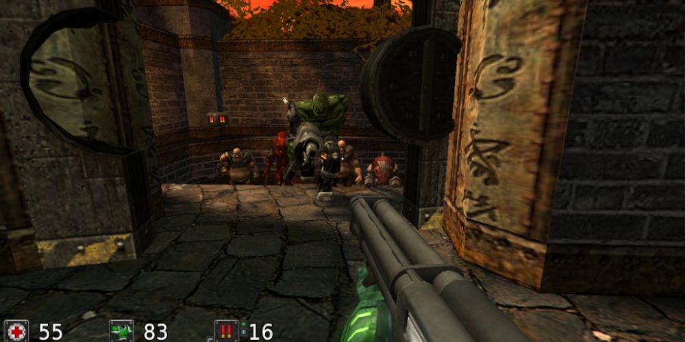 First-person perspective of a character wielding a shotgun and facing a horde of creatures at a hallway entrance. Source: indieplague.blogspot.com