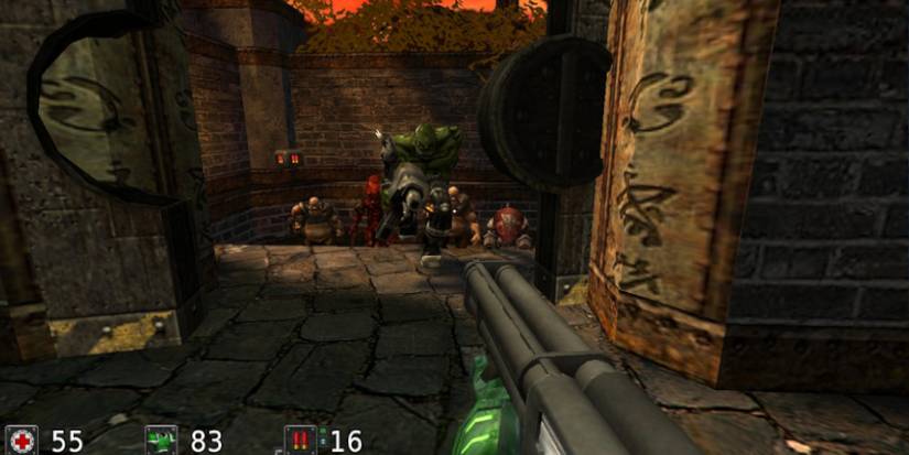 First-person perspective of a character wielding a shotgun and facing a horde of creatures at a hallway entrance. Source: indieplague.blogspot.com