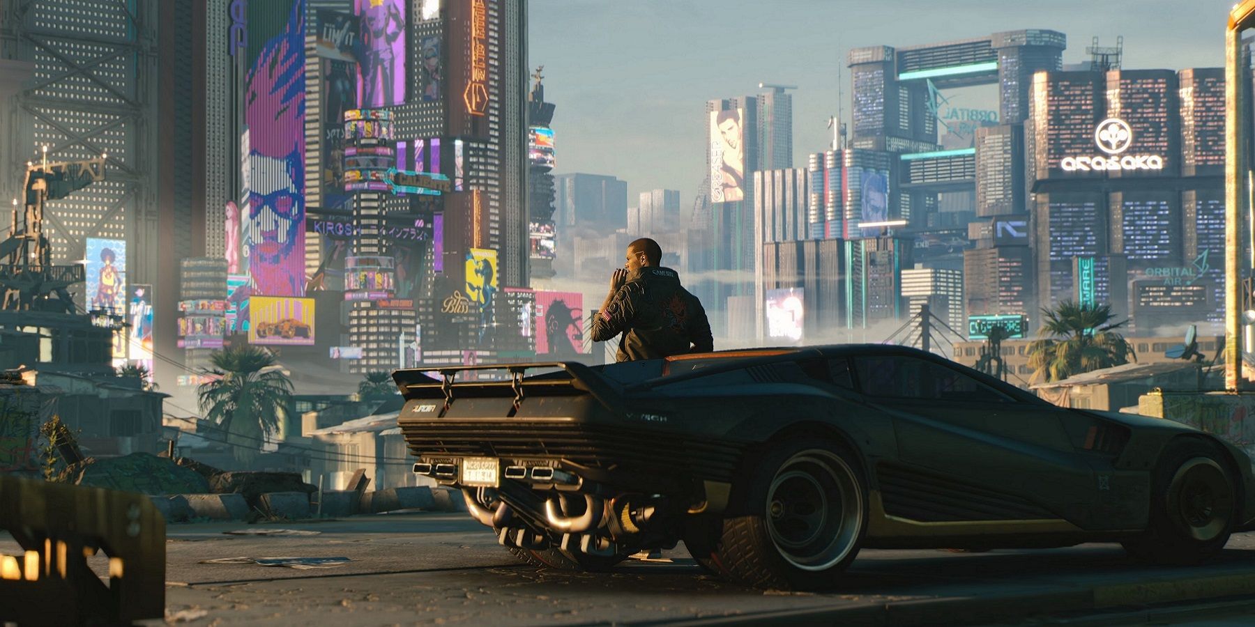 Image from Cyberpunk 2077 showing V leaning against a car as they look out onto Night City.