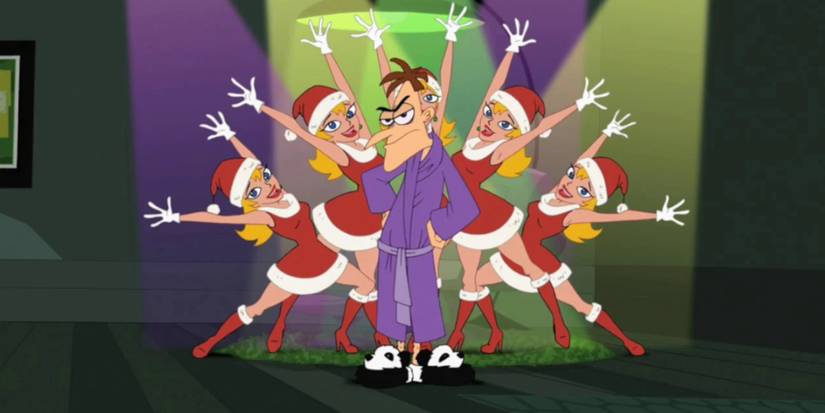 Dr. Heinz Doofenshmirtz, wearing a purple robe and panda slippers, standing in front of four blonde female dancers in Santa outfits with their hands in the air and under stage lights. Image source: PhineasandFerb.Fandom.com