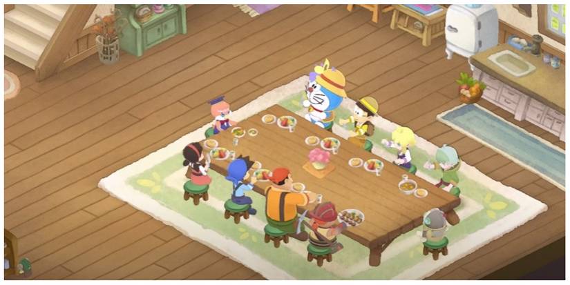 Doraemon and crew having their nightly dinner in Doraemon Story of Seasons: Friends of the Great Kingdom