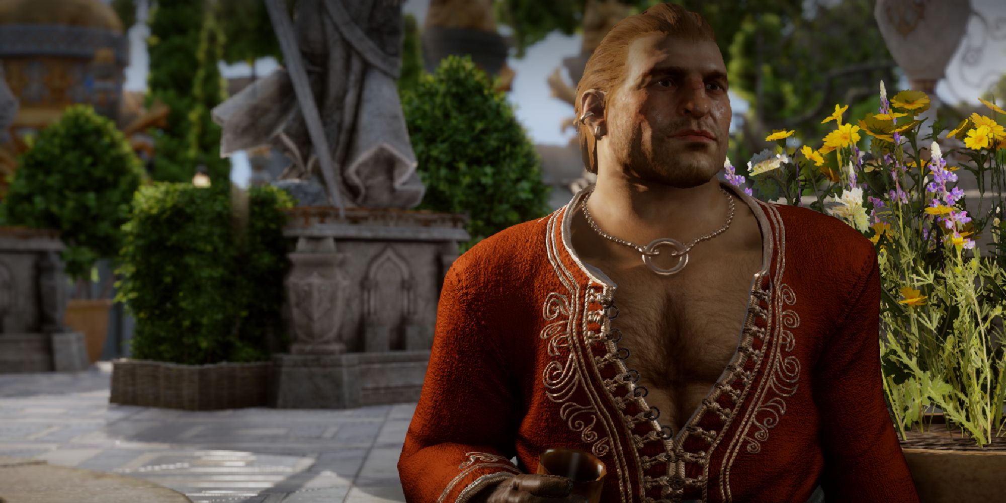 Varric as shown in Inquisiton in his signature red unbuttoned shirt, holding a golden chalice, standing in a palatial courtyard of stone and flowers