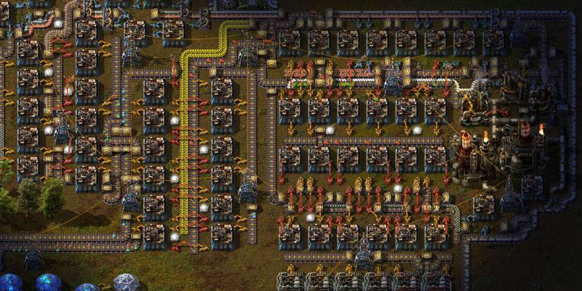 A screenshot from Factorio showing a large complex factory