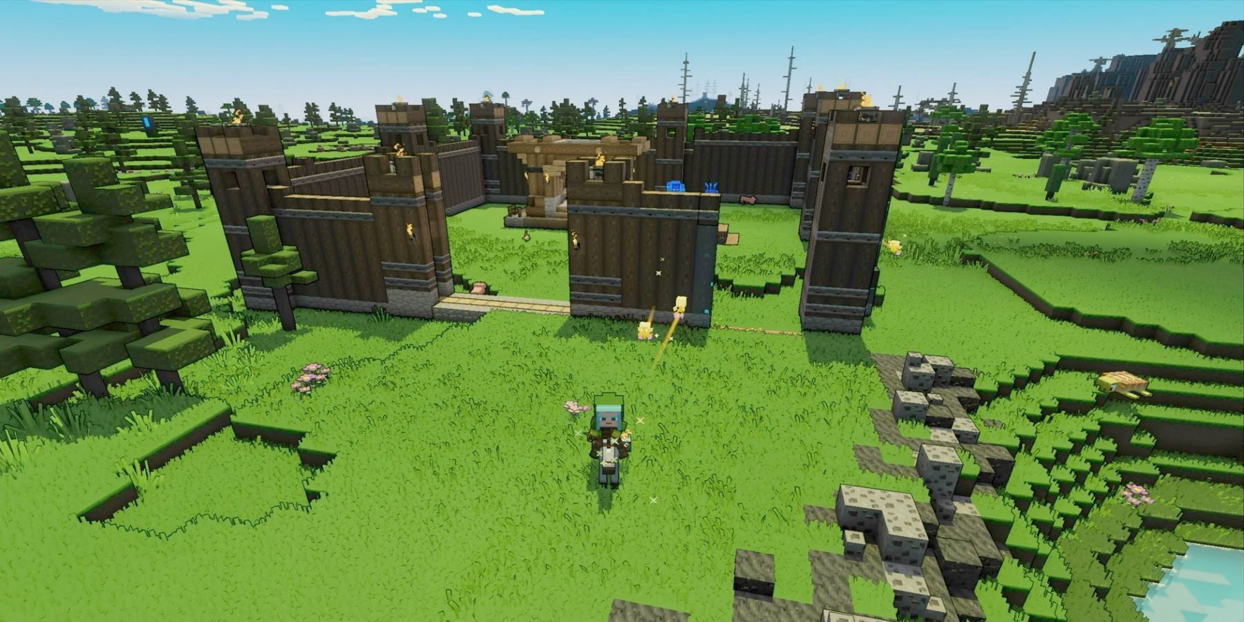 A Minecraft Legends player stands by as an Allay builds a wooden fort