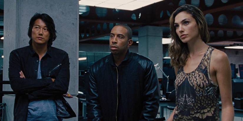 Sung Kang as Han, Ludacris as Tej and Gal Gadot as Gisele in Fast & Furious 6 garage