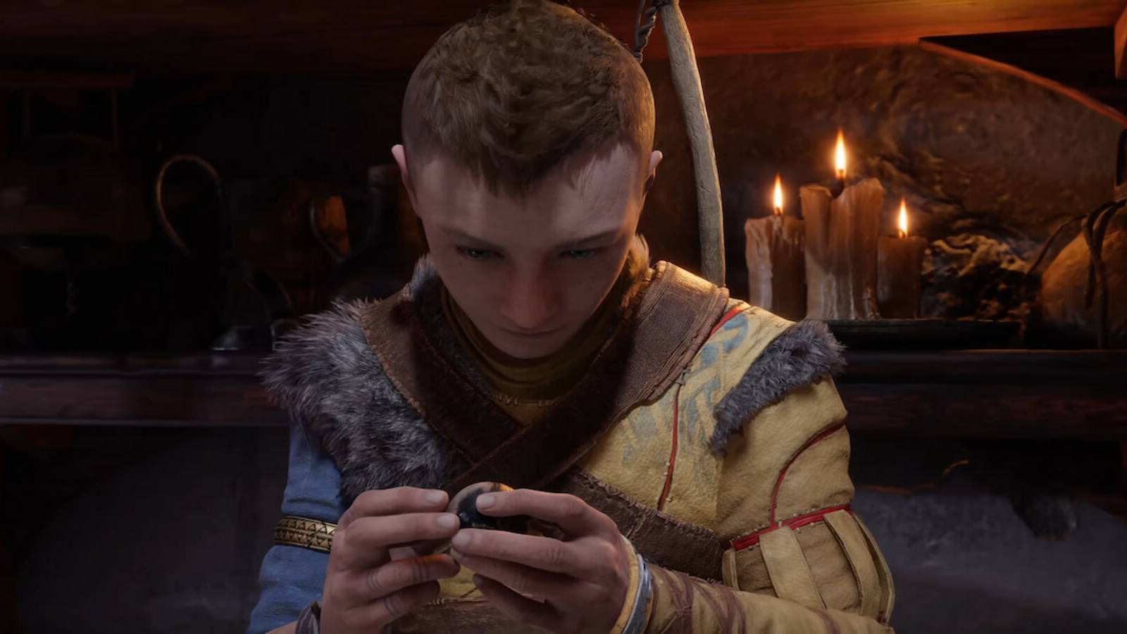 god-of-war-ragnarok-atreus-looks-at-giant-orb