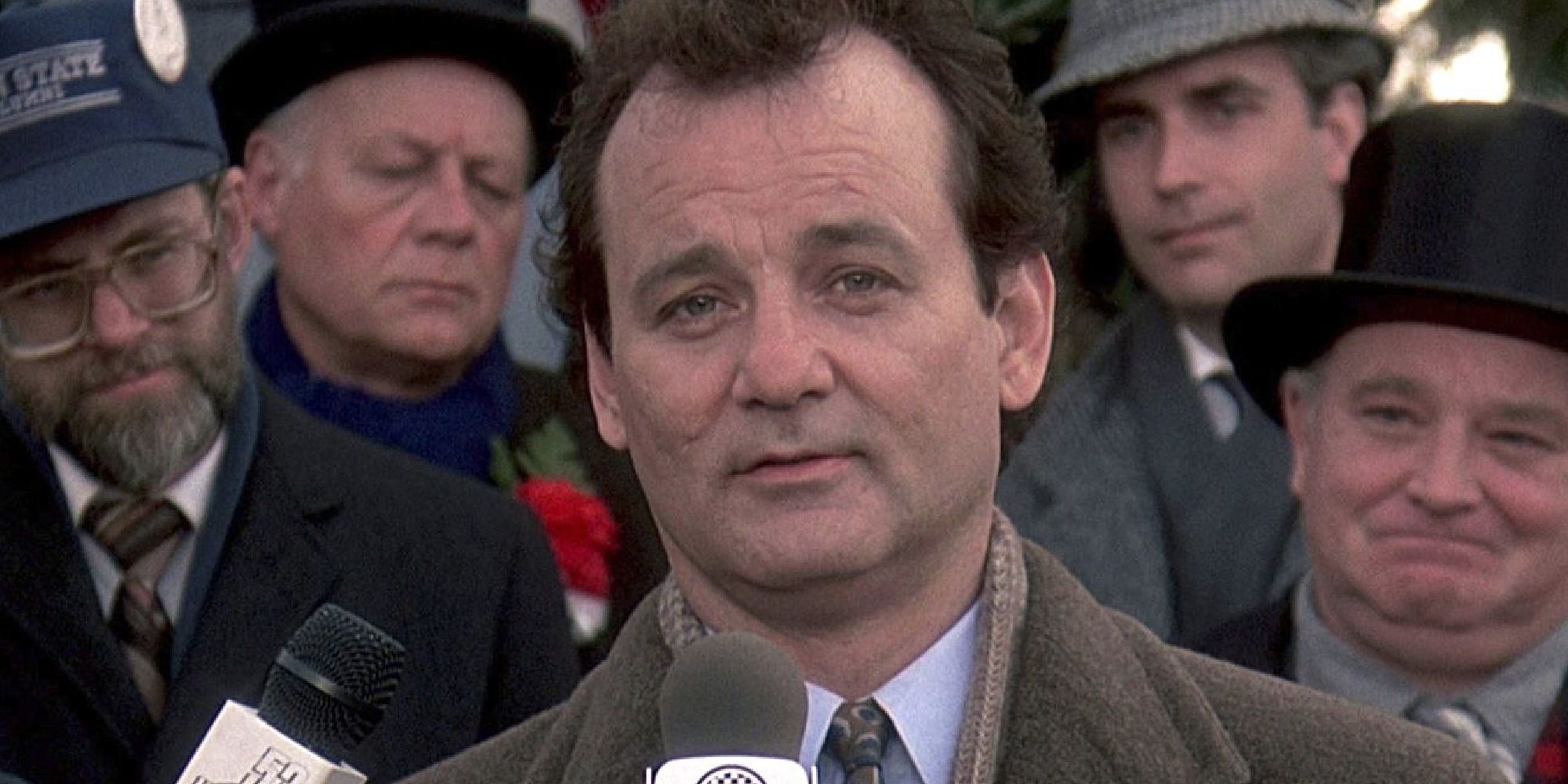 Bill Murray reporting the news in front of a crowd