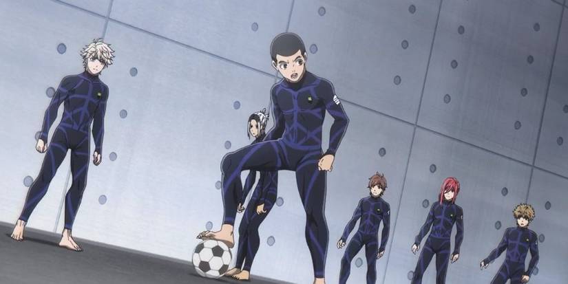 Gurimu Igarashi in Blue Lock with a ball and members of Team Z surrounding him.