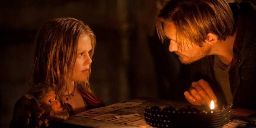 Zoe and Ray looking at each other in Hidden