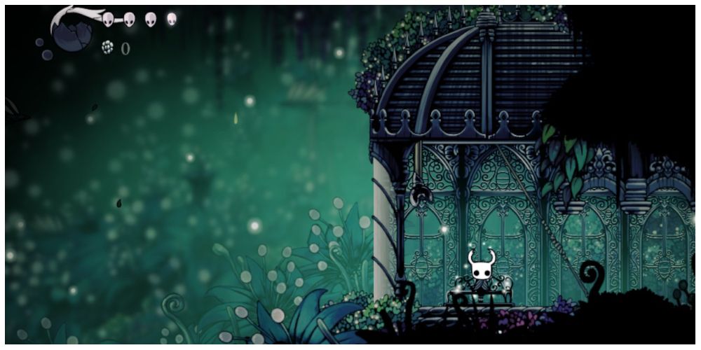 the Knight sitting on a bench in Hollow Knight