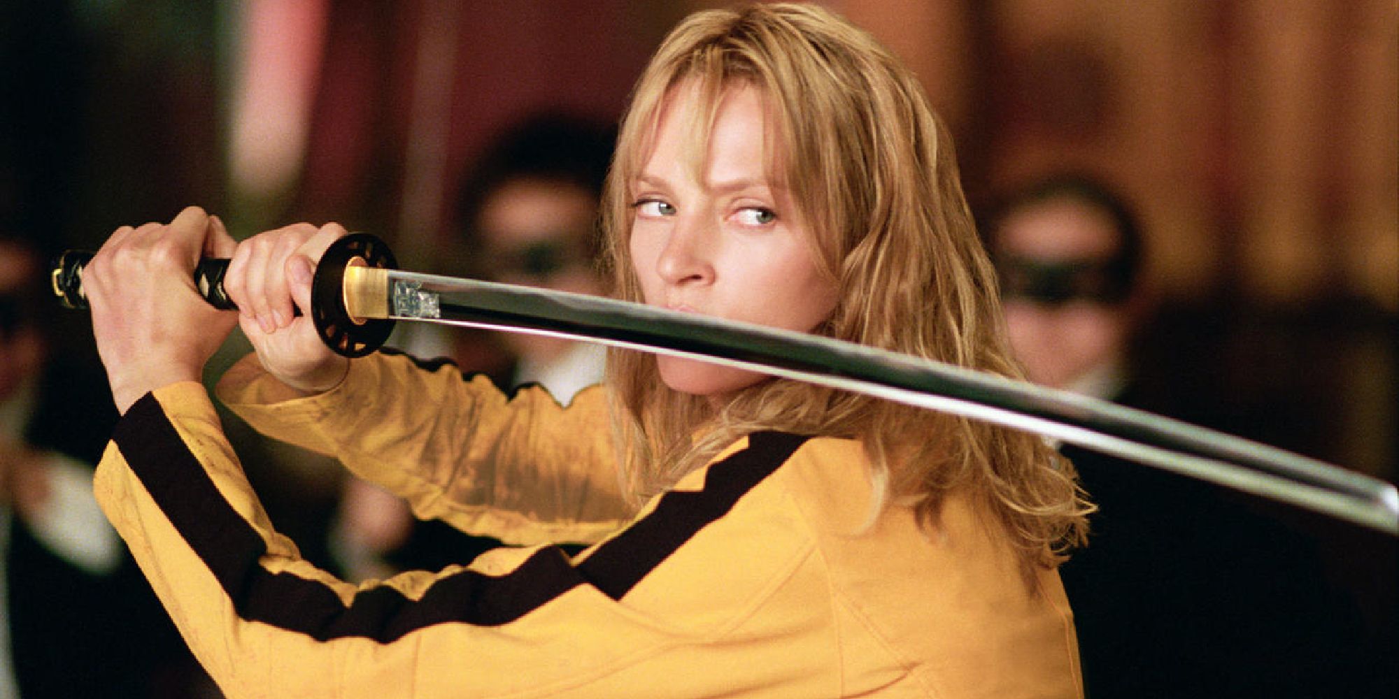 Uma Thurman as the Bride wielding a katana