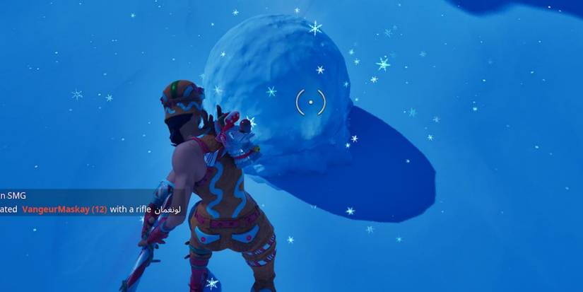 hitting snow with pickaxe to make snowball