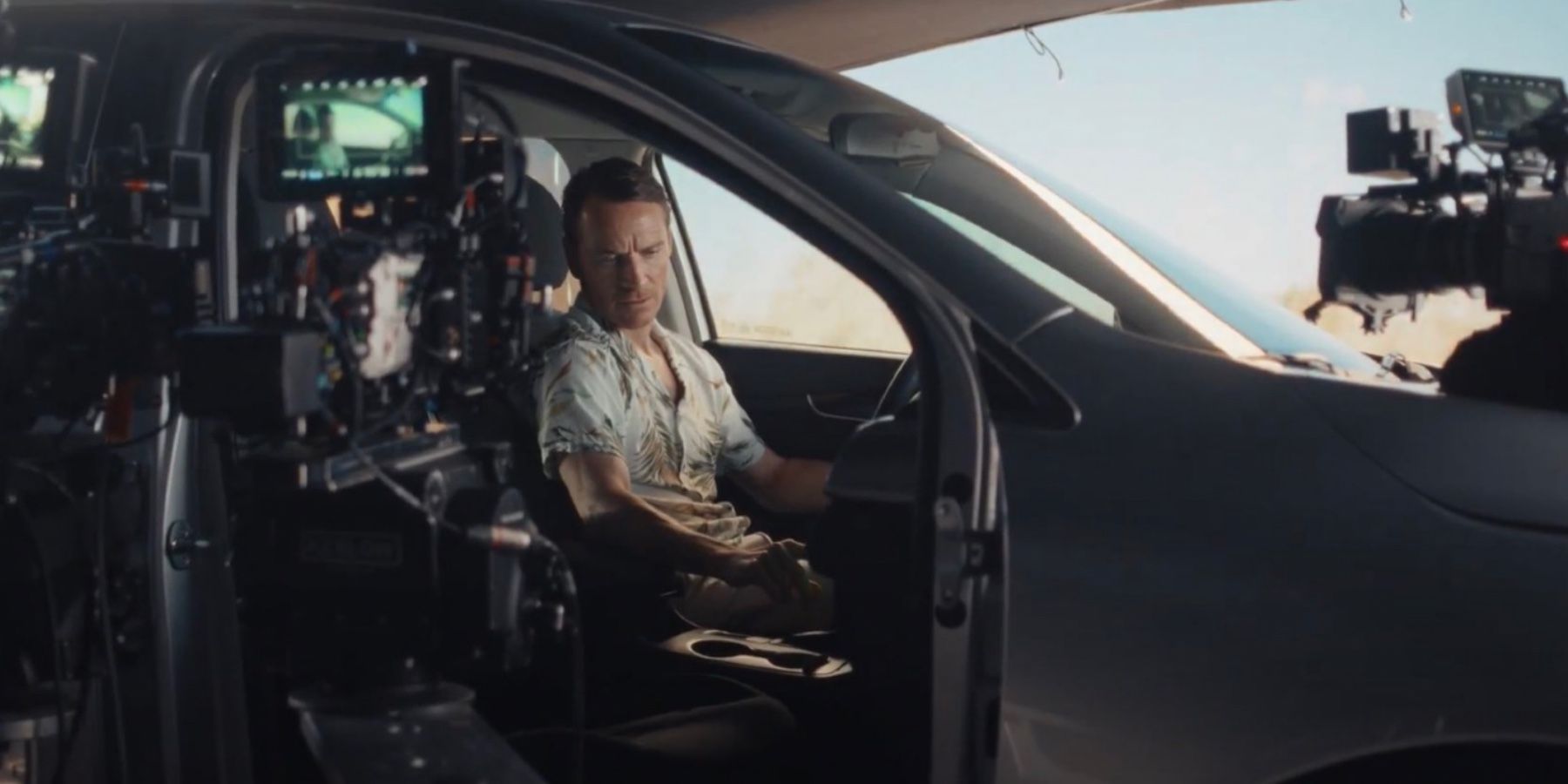 Michael-Fassbender-in-a-car-behind-the-scenes-of-The-Killer