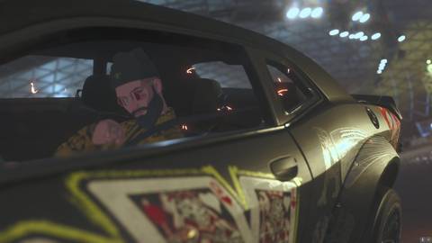 driver motioning from within a dodge challenger