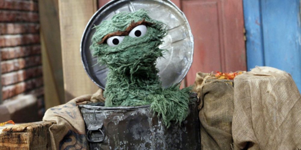 Oscar the Grouch in his trash can. Image source: moms.com