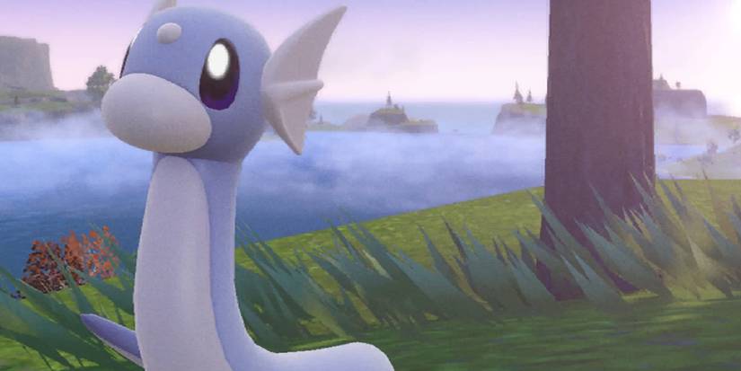 Dratini residing near a foggy lake in Scarlet/Violet