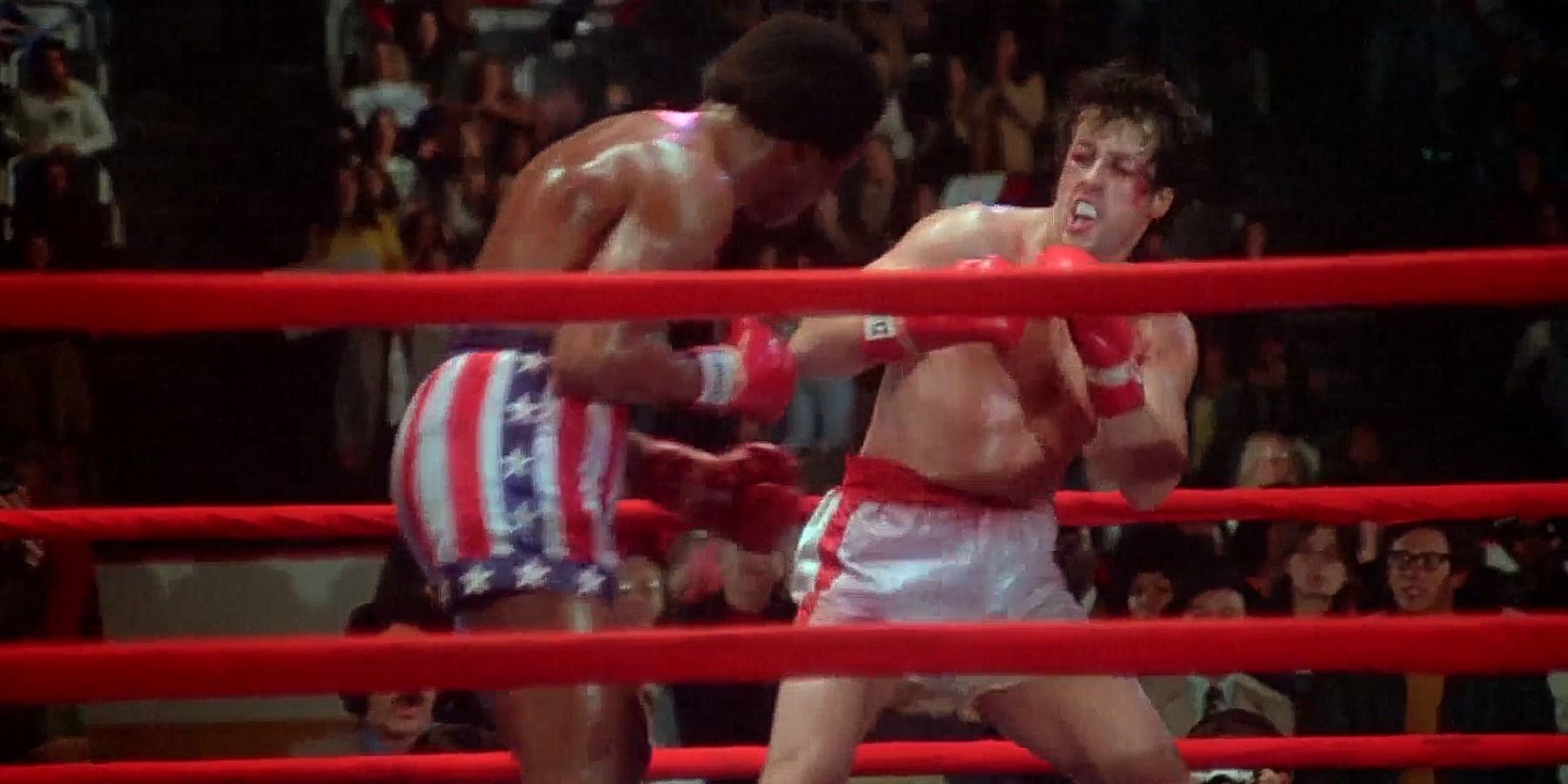 Sylvester Stallone as Rocky fighting Apollo Creed