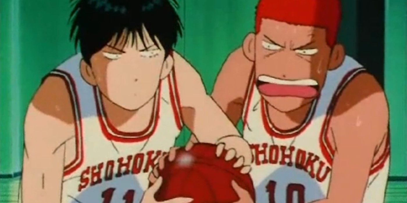 Slam Dunk Sakuragi and Rukawa fighting over a ball