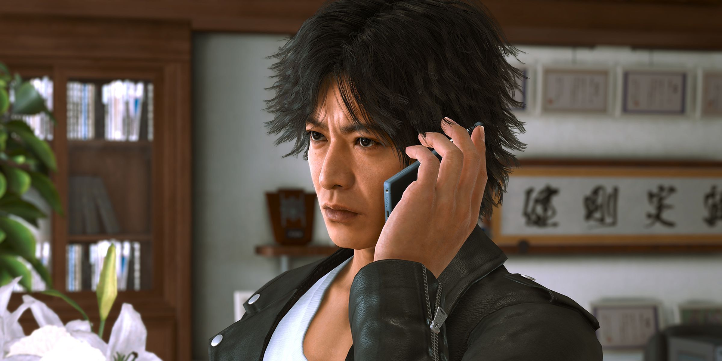 Takayuki Yagami taking a phone call in Lost Judgment