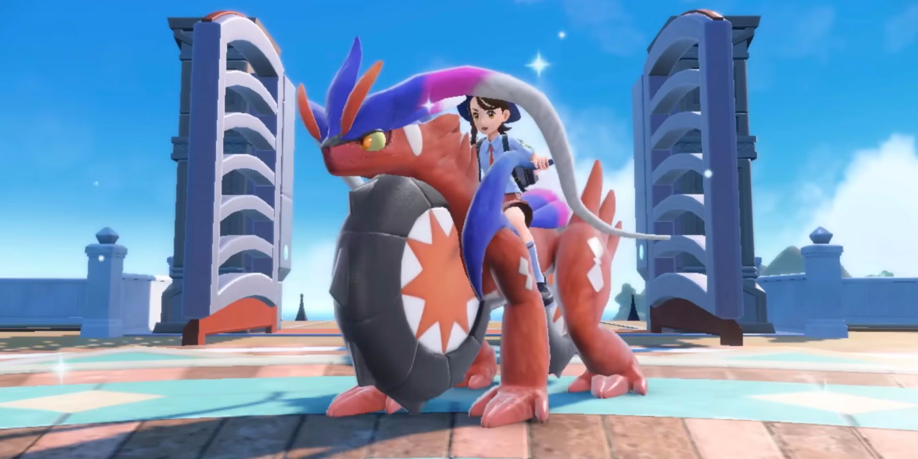 Trainer riding on a Koraidon in Pokemon Scarlet and Violet