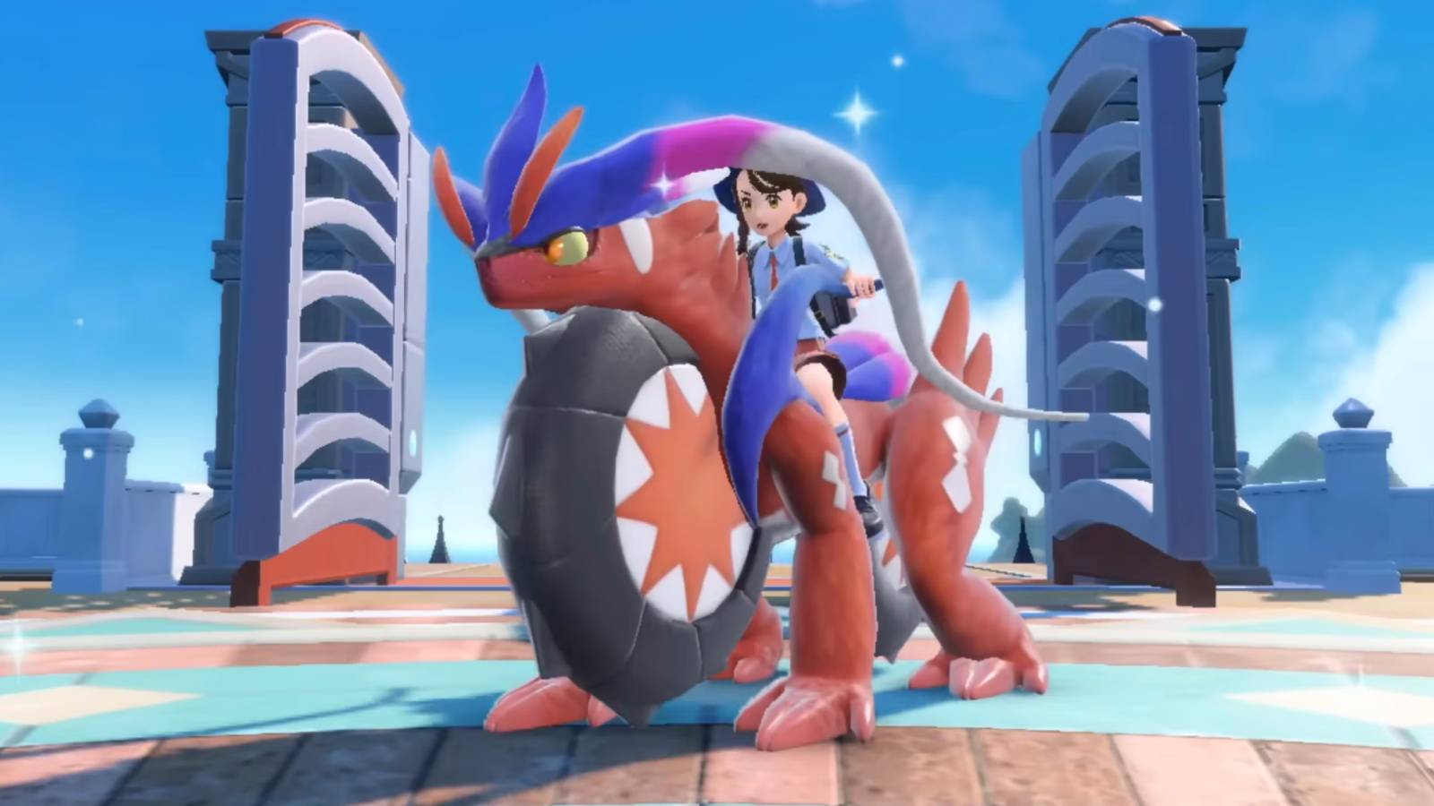 Trainer riding on a Koraidon in Pokemon Scarlet and Violet