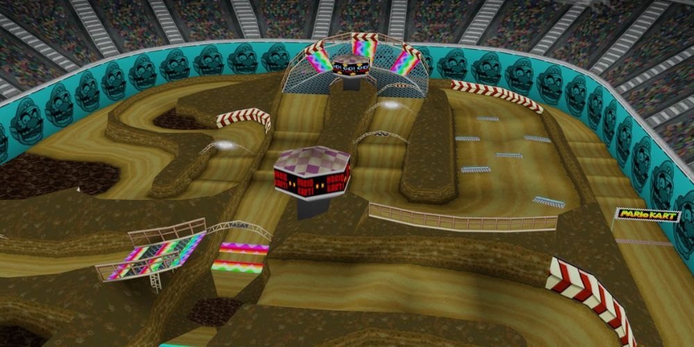 Overhead shot of Wario stadium with finish line, dirt track, and dash pads from Mario Kart 64