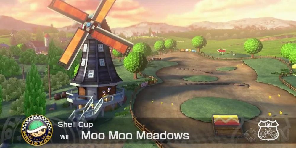 Screenshot of Moo Moo Meadows with windmill and trees on Shell Cup from Mario Kart 8