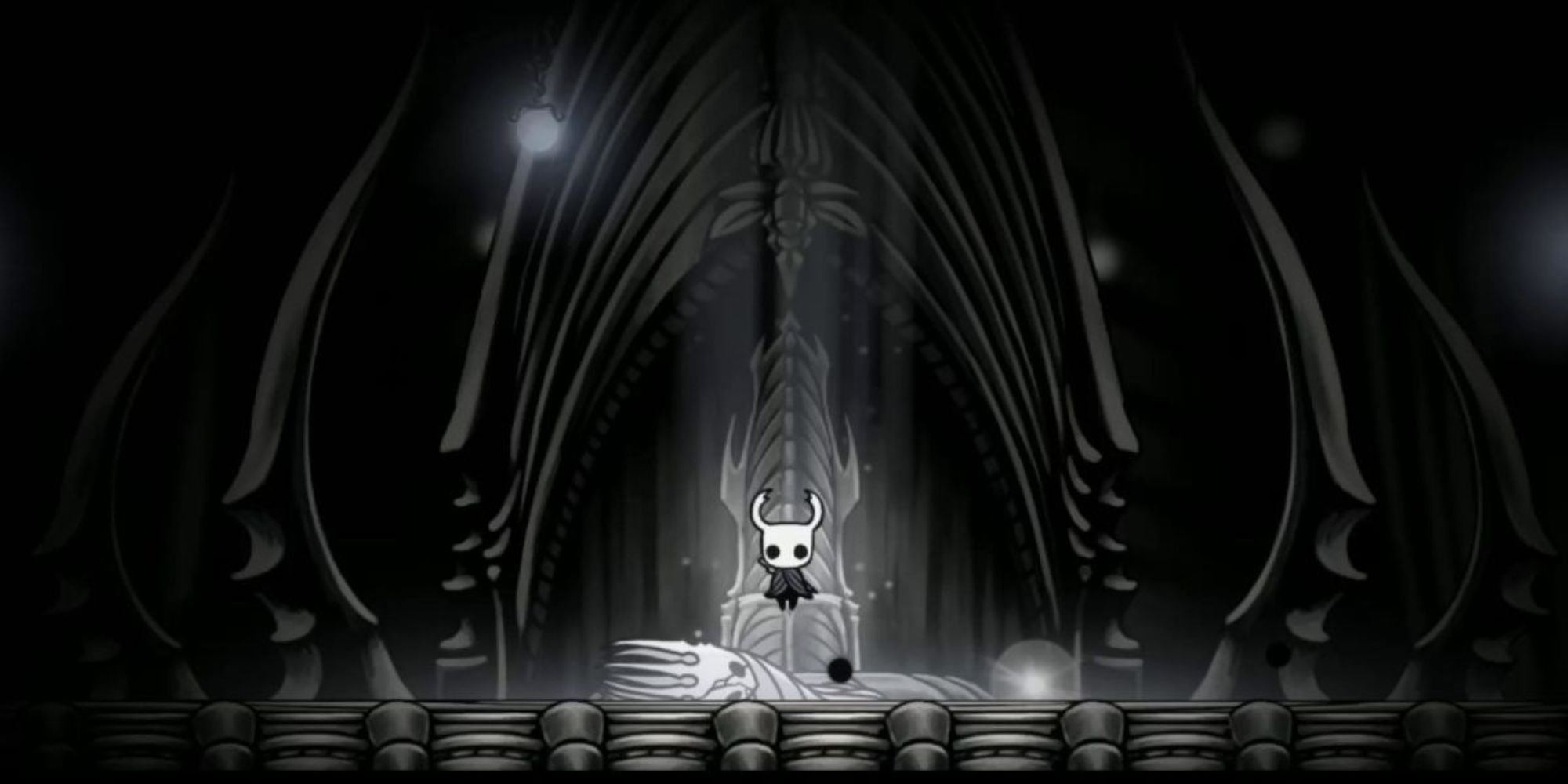 Hollow Knight sat on The Pale King Throne