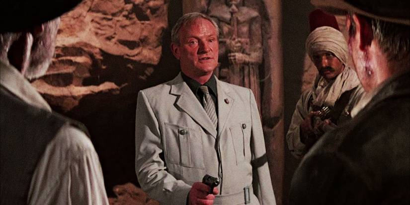 walter donovan pointing a gun at henry jones