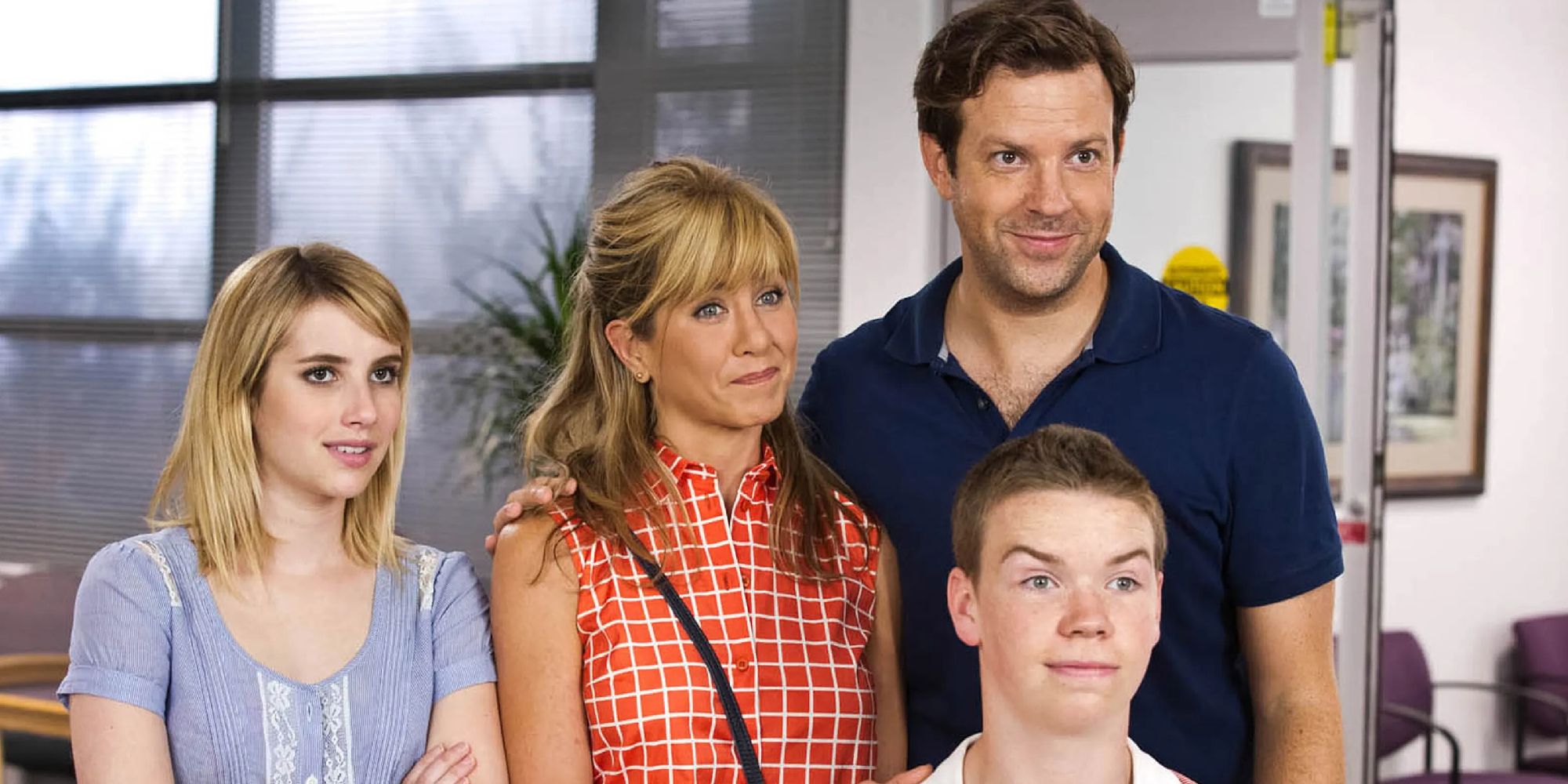 Emma Roberts, Jennifer Aniston, Jason Sudeikis, and Will Poulter all smiling in "We're the Millers"