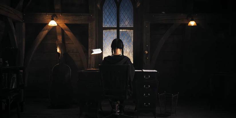 Wednesday Addams working on her novel in her dorm room