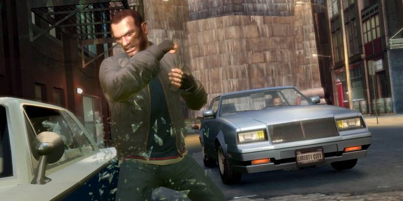 Niko Bellic smashes a parked car's window