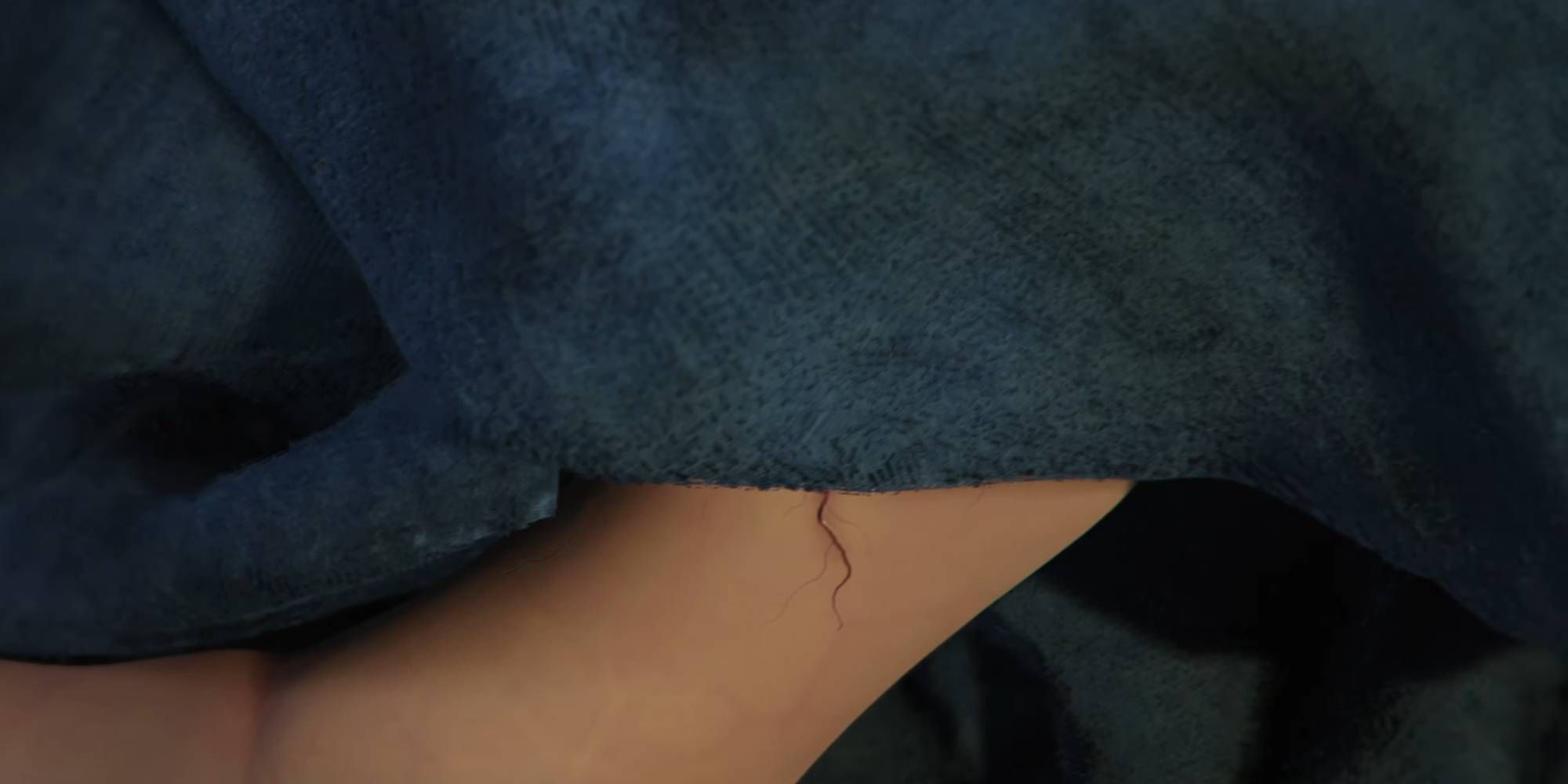 A newborn's arm showing the Prima Macula in A Plague Tale: Requiem's post credit scene