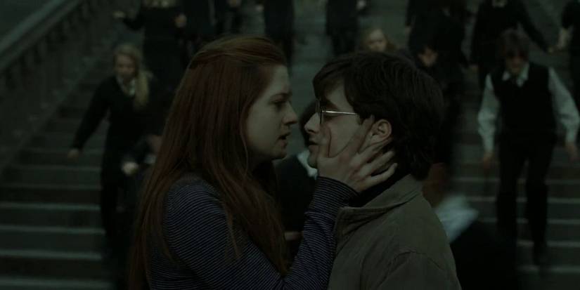 Ginny Weasley holding Harry Potter's face in Harry Potter and the Deathly Hallows Part 2
