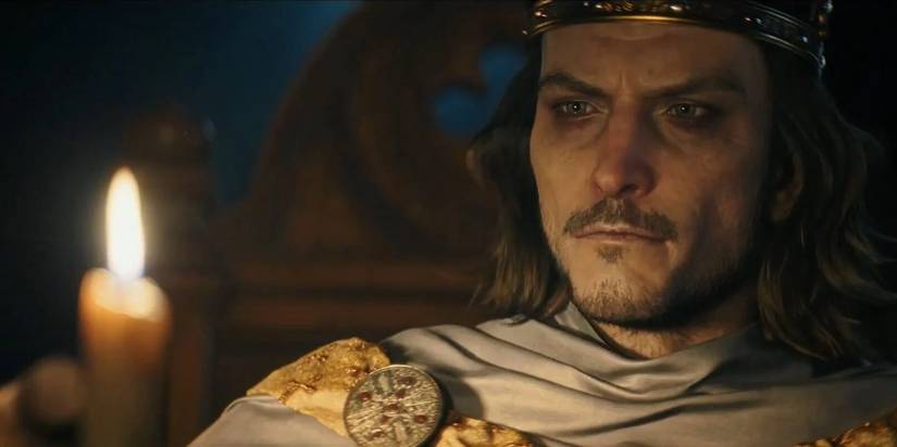 AC Valhalla Alfred the Great Looking at Candle (1) Cropped